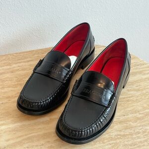 Salvatore Ferragamo Black Leather Penny Loafers with Red Interior